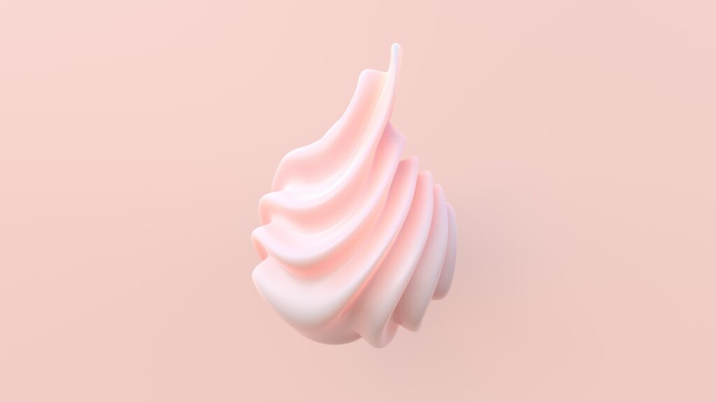Pink swirly ice cream on pink background